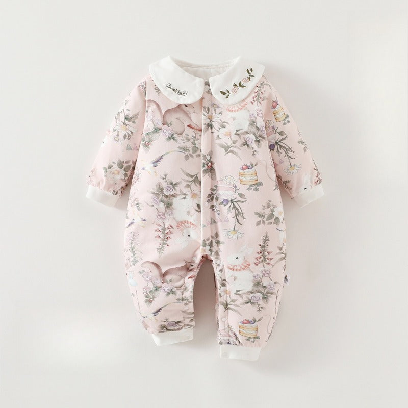 Floral-patterned baby onesie on a white background