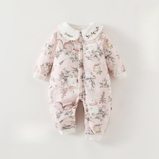 Floral-patterned baby onesie on a white background